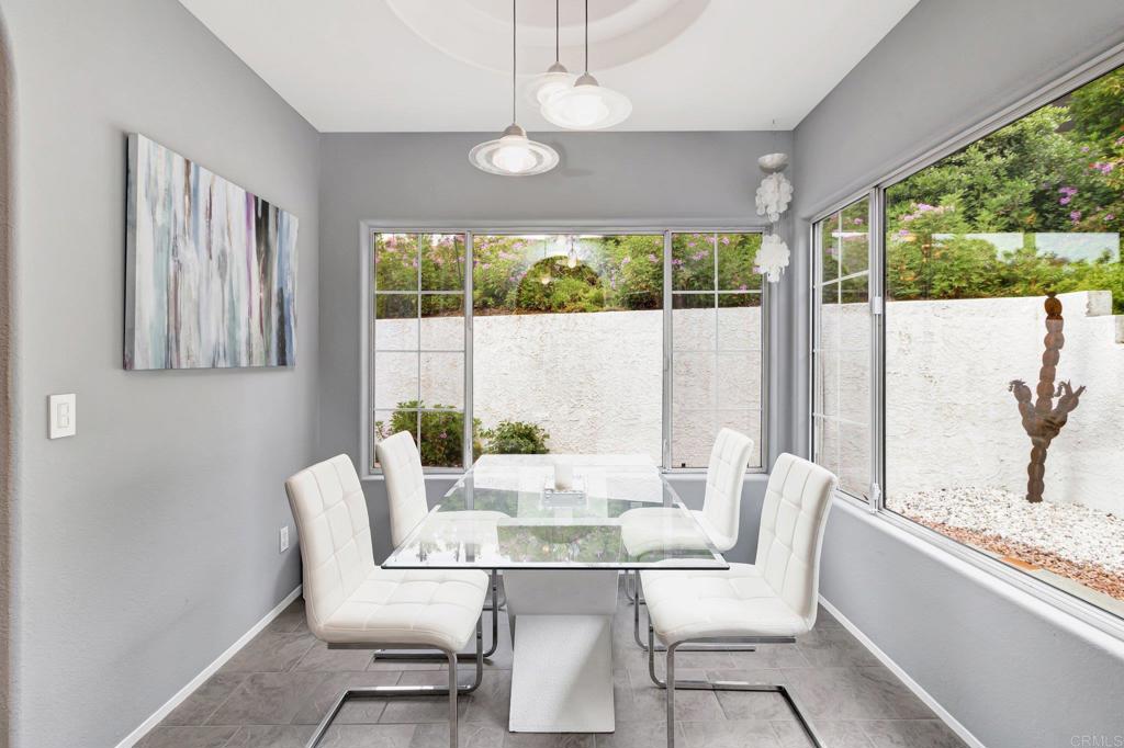 1205 Rancho Pacifica Place Vista, CA 92084 - Photo 12 of 42 a view of a dining room with furniture window and outside view