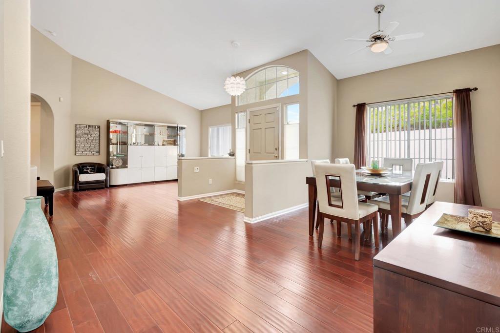 1205 Rancho Pacifica Place Vista, CA 92084 - Photo 30 of 42 a view of a dining room with furniture window and wooden floor