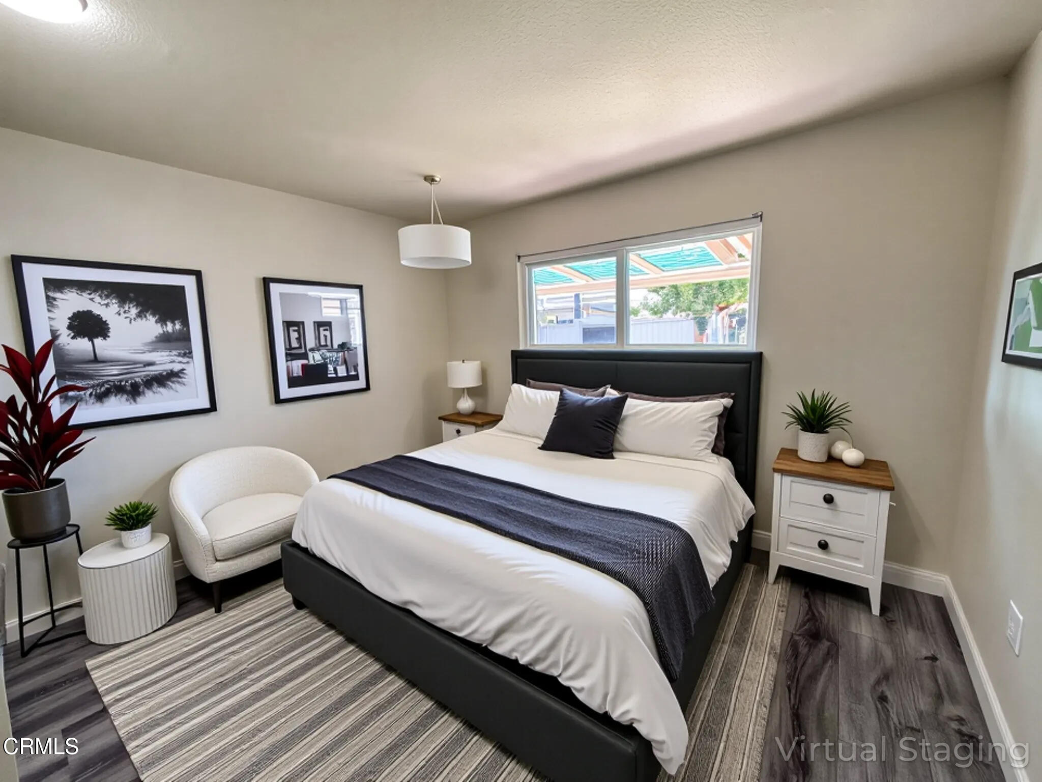 1730 West Hemlock Street Oxnard, CA 93035 - Photo 15 of 25 a bedroom with bed and a window