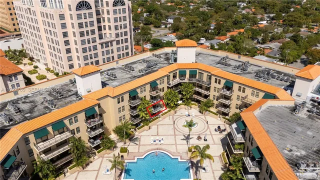 a room with furniture a washer and dryer