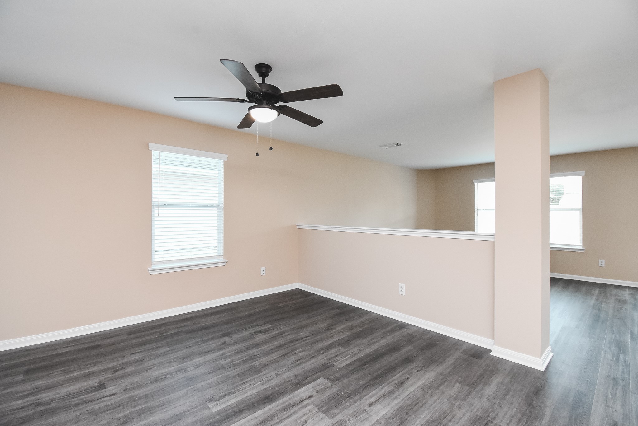 20815 Baronsledge Lane Katy, TX 77449 - Photo 7 of 31 a view of empty room with wooden floor and fan