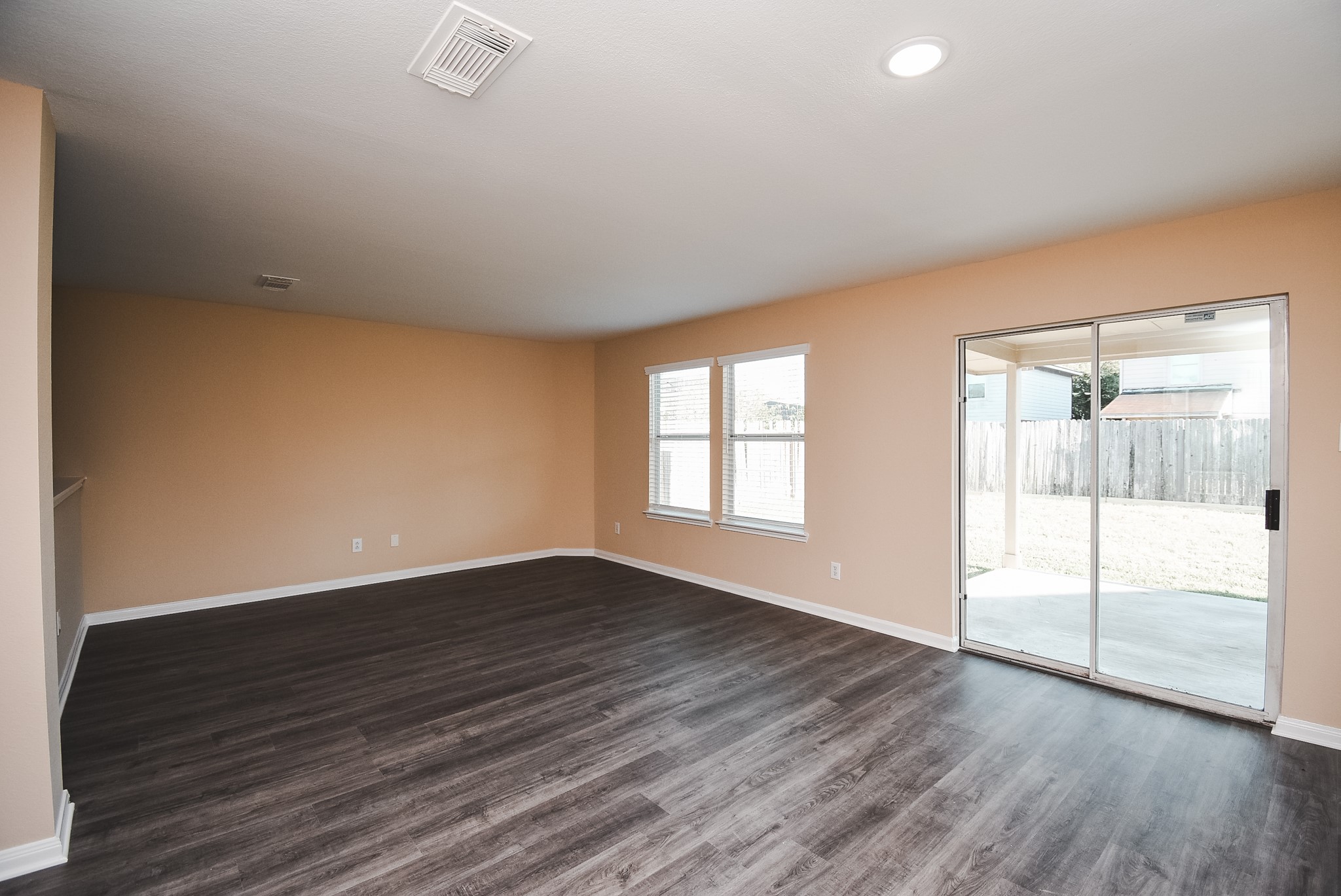 20815 Baronsledge Lane Katy, TX 77449 - Photo 10 of 31 wooden floor in an empty room with a window