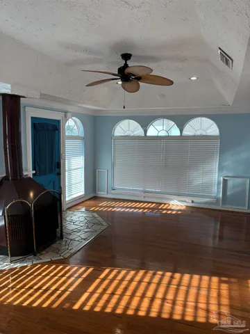 a view of a livingroom with furniture and chandelier