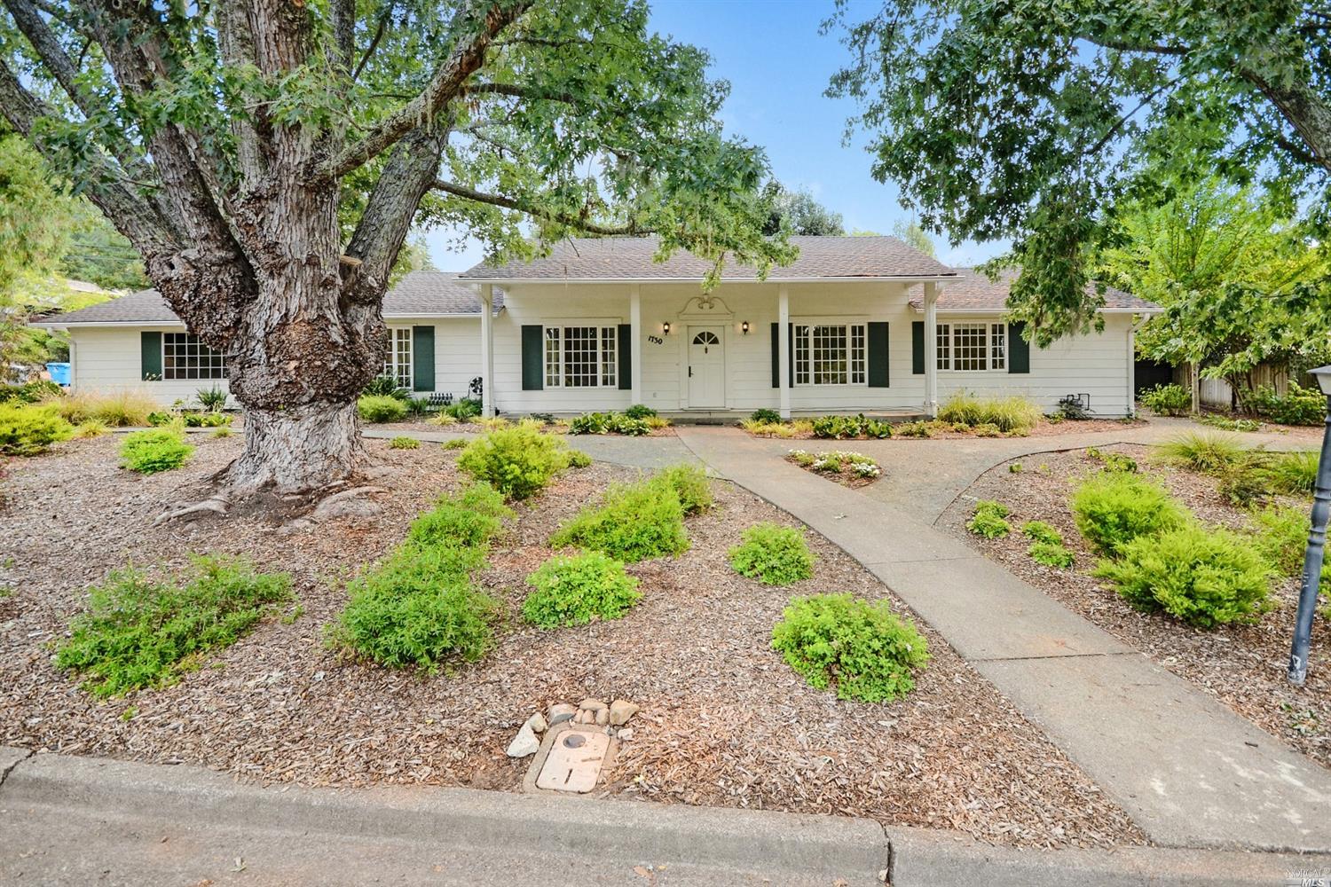 1730 St Francis Road Santa Rosa, CA 95409 - Photo 1 of 1 a front view of a house with garden and porch