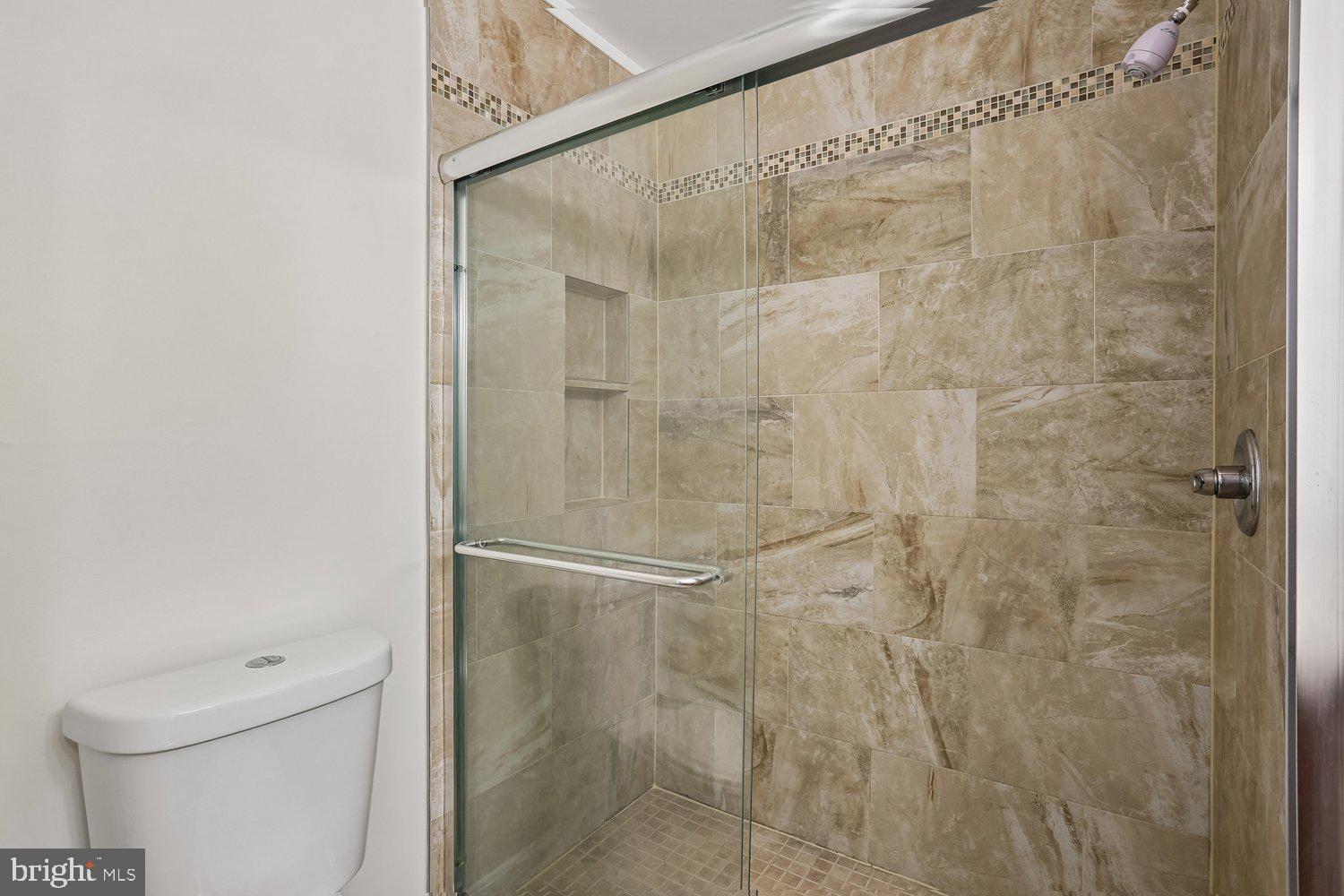 10804 Douglas Avenue Silver Spring, MD 20902 - Photo 27 of 46 Updated primary bath with walk-in shower