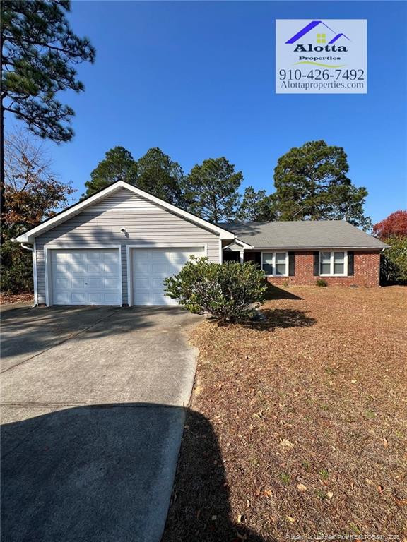 732 Rim Road Fayetteville, NC 28314 - Photo 1 of 17 a front view of a house with yard