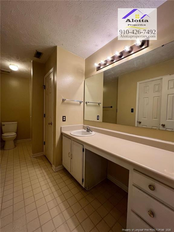 732 Rim Road Fayetteville, NC 28314 - Photo 11 of 17 a bathroom with a sink and a mirror