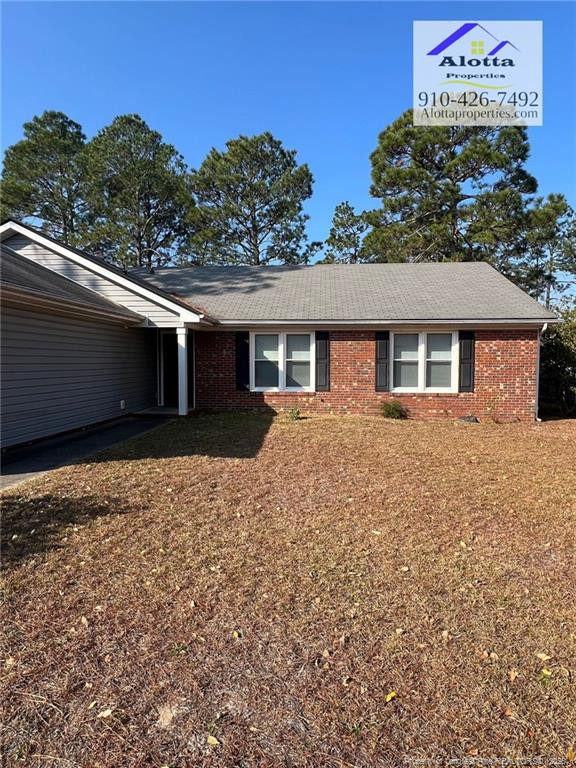 732 Rim Road Fayetteville, NC 28314 - Photo 2 of 17 a front view of a house with a yard