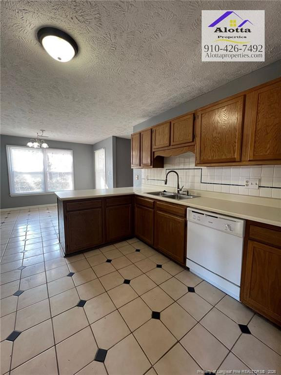 732 Rim Road Fayetteville, NC 28314 - Photo 8 of 17 a kitchen with stainless steel appliances granite countertop a sink and cabinets