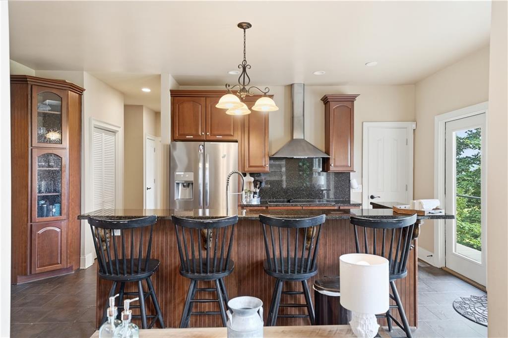 97 Eagle Ridge Trail Cleveland, GA 30528 - Photo 23 of 58 a view of a dining room with furniture window and wooden floor