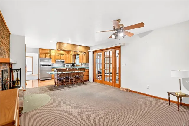 a bedroom with furniture and a chandelier