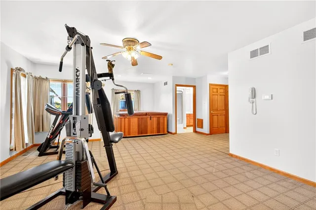 a bedroom with furniture and window