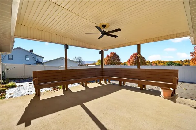 a view of parking space in front of a house