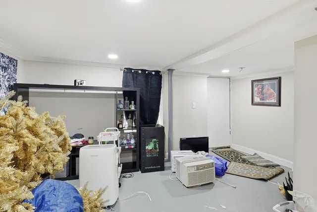 a bedroom with a workspace