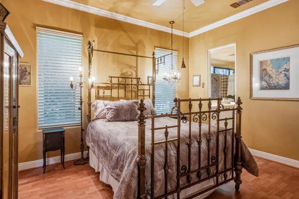 a view of a balcony with furniture and wooden floor