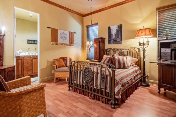 a bedroom with furniture and a couch