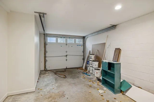 a view of room with stairs and window