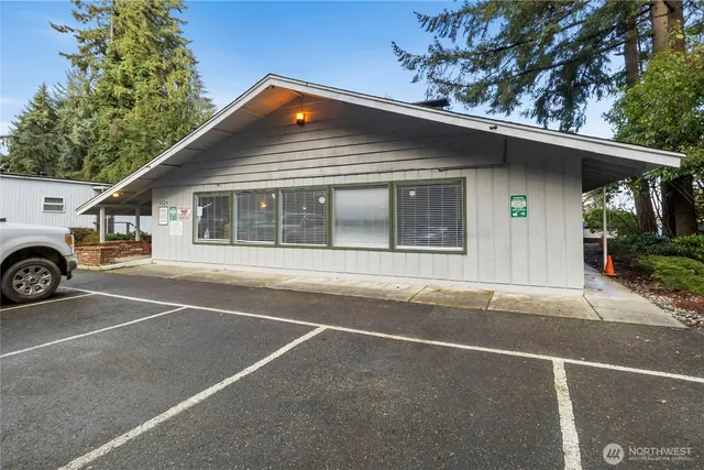 a room with lots of furniture and a view of living room