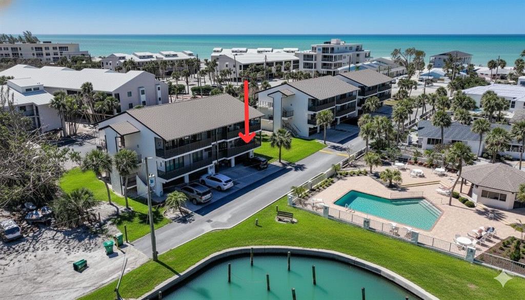 an aerial view of a house with outdoor space