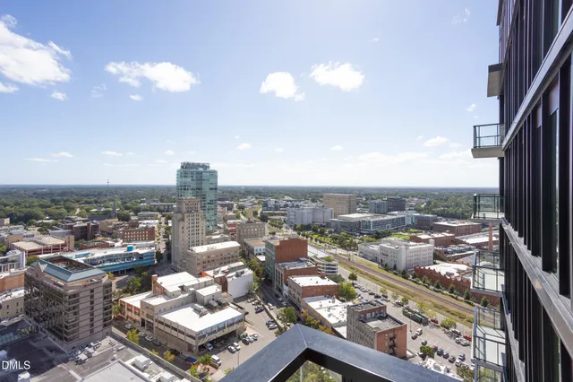 a view of a city with tall buildings