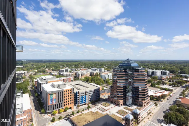 a large building with a swimming pool