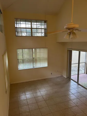 a view of an empty room and window