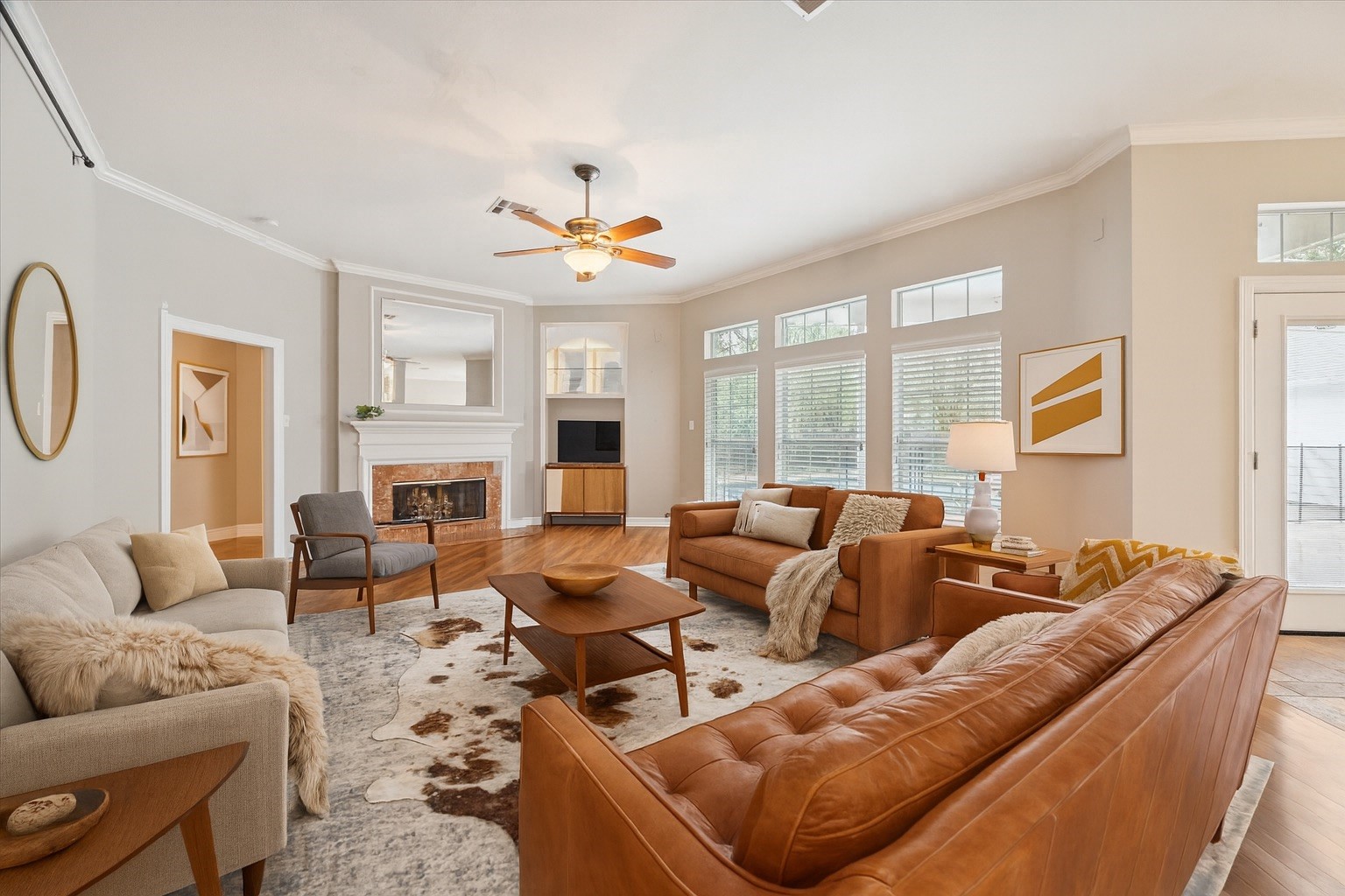 304 Scenic View Friendswood, TX 77546 - Photo 11 of 41 a living room with furniture a fireplace and a large window
