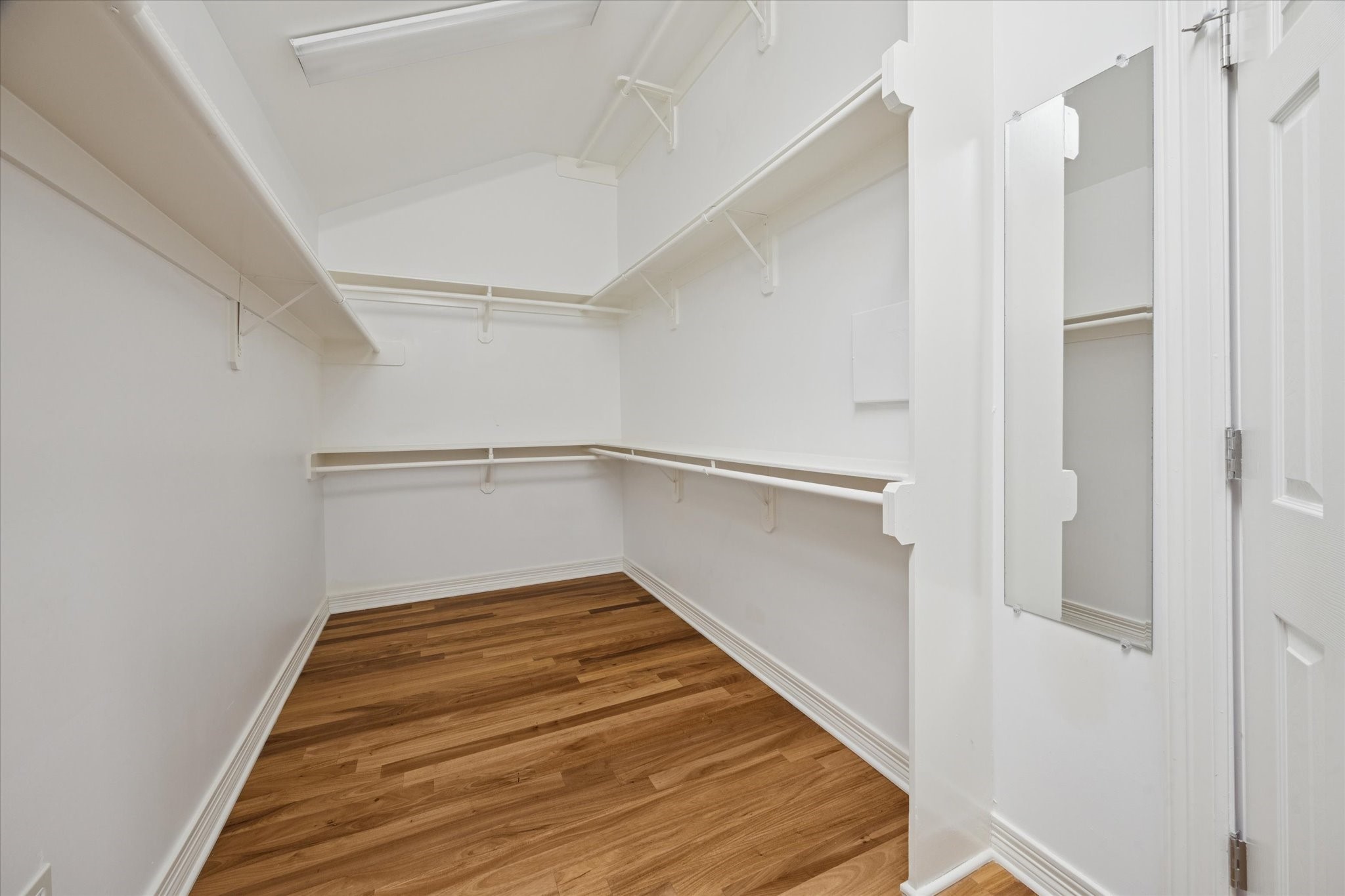 304 Scenic View Friendswood, TX 77546 - Photo 34 of 41 This primary bedroom has THREE HUGE WALK-IN CLOSETS!! One for each of the Texas seasons: Fall, Spring and Summer!