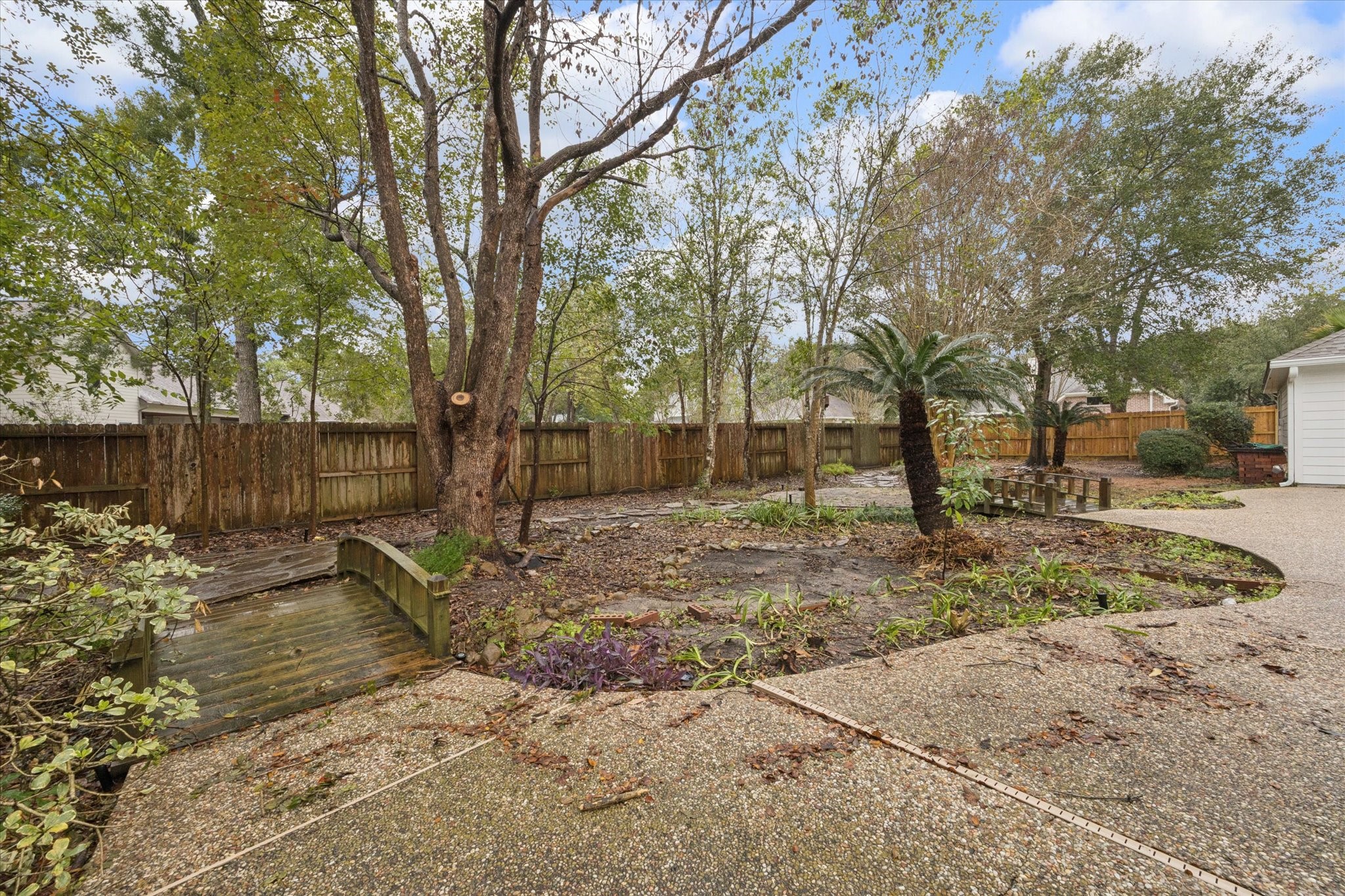 304 Scenic View Friendswood, TX 77546 - Photo 40 of 41 Another view of this incredibly landscaped back yard.