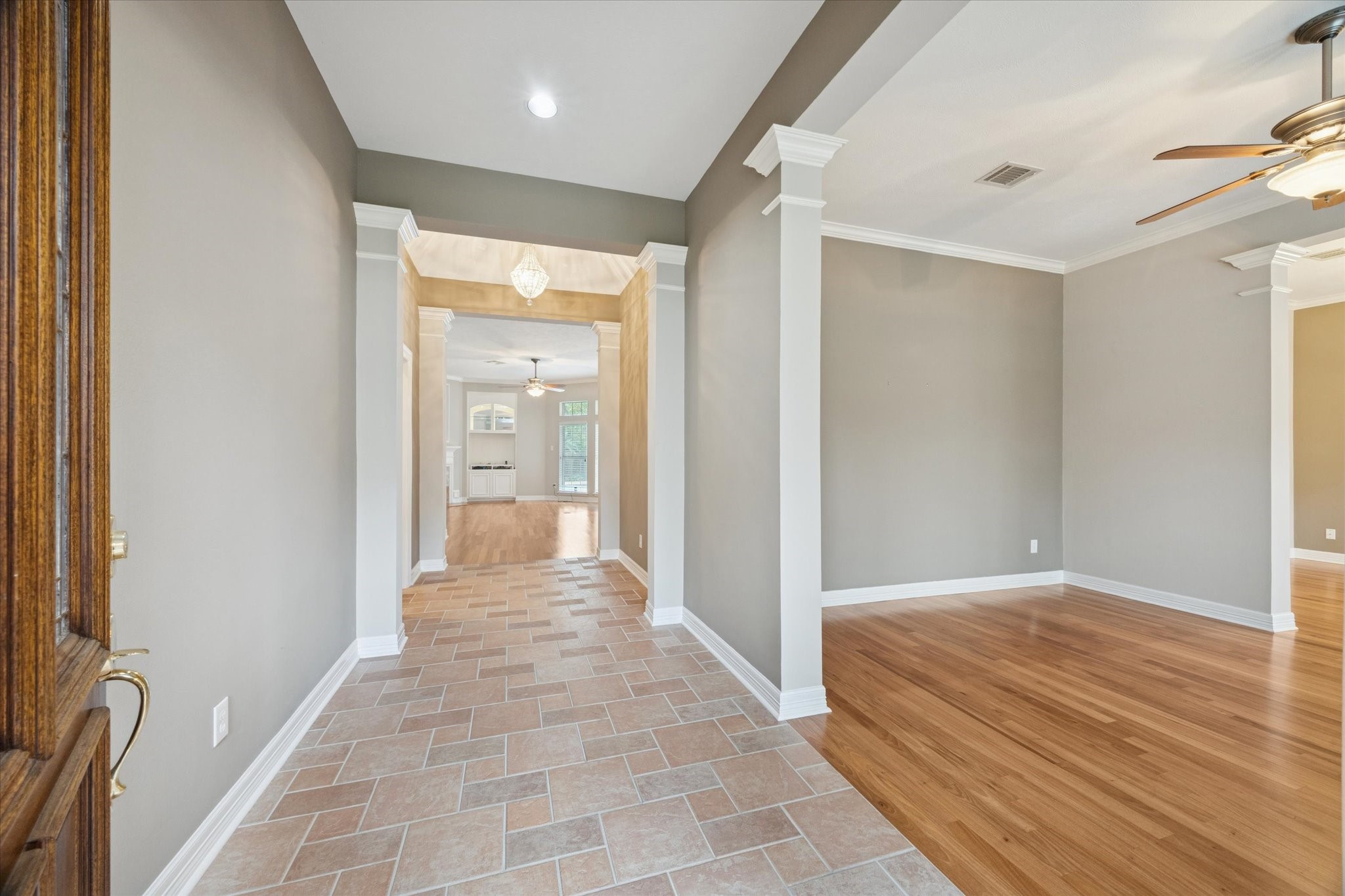 304 Scenic View Friendswood, TX 77546 - Photo 5 of 41 The grand entry will beckon all who enter to stay awhile!