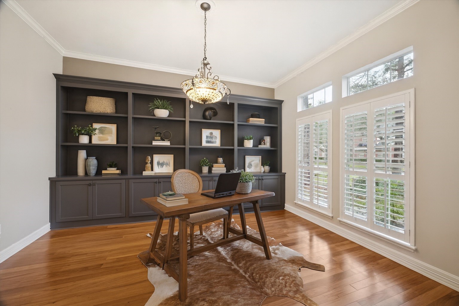 304 Scenic View Friendswood, TX 77546 - Photo 9 of 41 a workspace with furniture window and wooden floor
