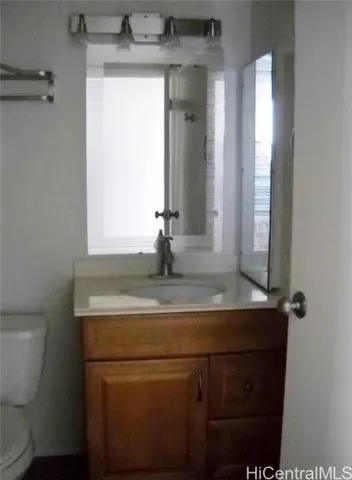 a view of a room that has a window in it