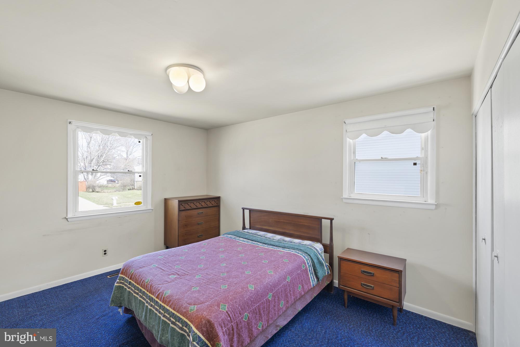 8605 Lucerne Road Randallstown, MD 21133 - Photo 18 of 30 a bedroom with a bed and a window