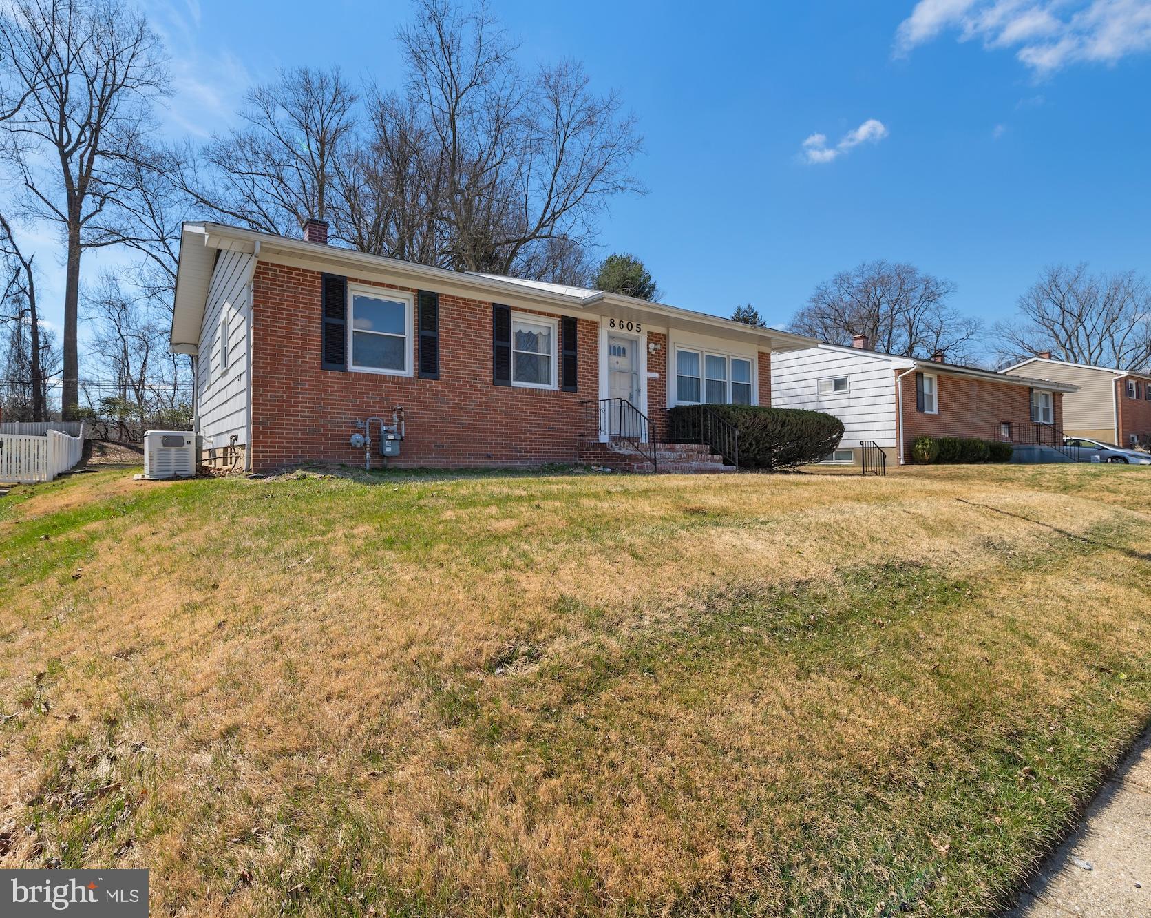 8605 Lucerne Road Randallstown, MD 21133 - Photo 3 of 30 a view of a house with a yard
