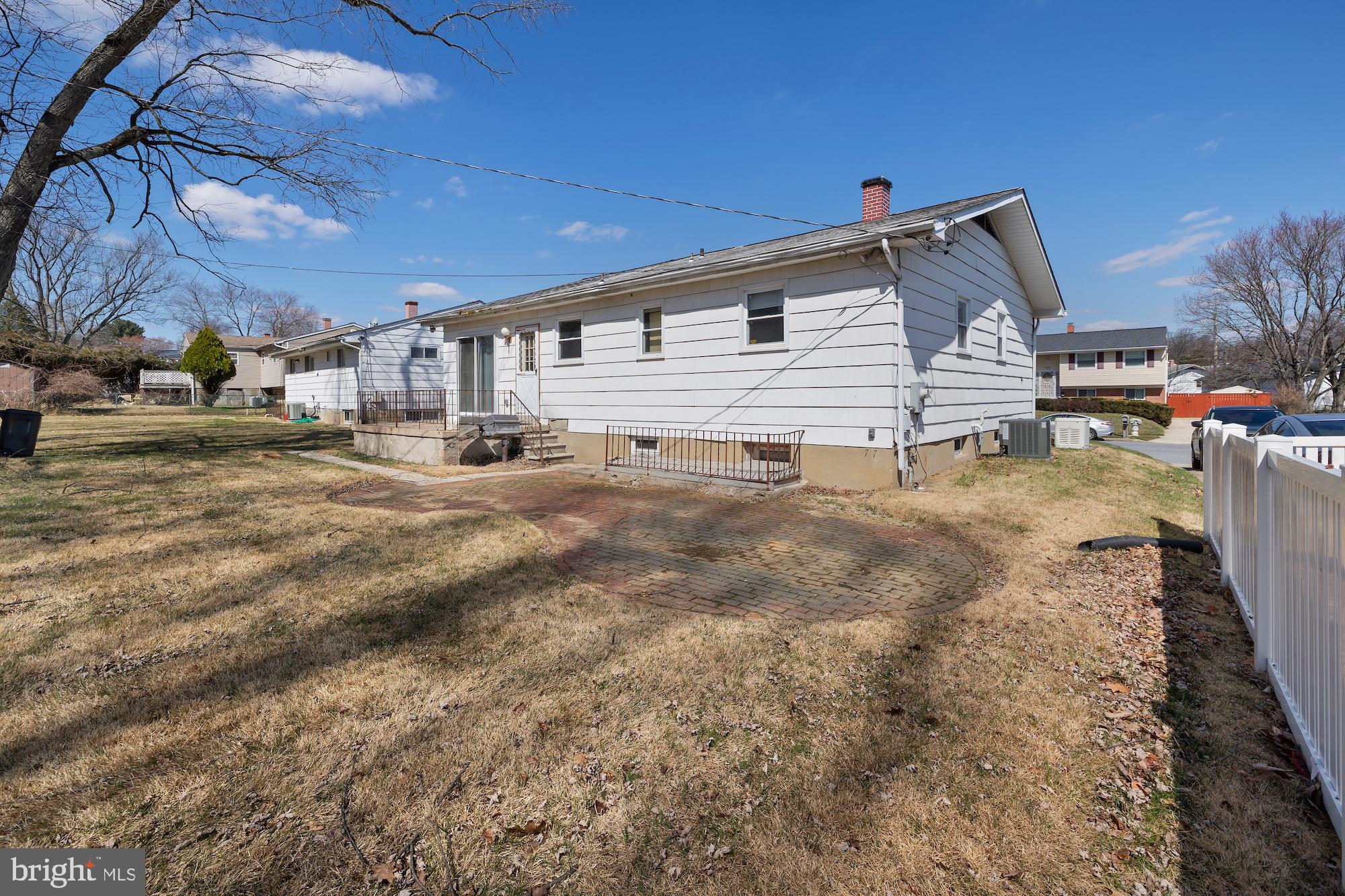 8605 Lucerne Road Randallstown, MD 21133 - Photo 5 of 30 a view of a house with a yard