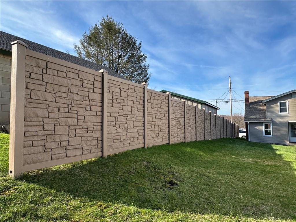409 South Summit Street Derry, PA 15627 - Photo 43 of 47 privacy wall to the right of the home