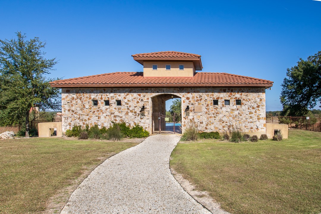 204 Via Daniela Florence, TX 76527 - Photo 4 of 8 a front view of a house with garden