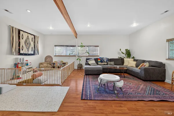 a living room with furniture and a couch