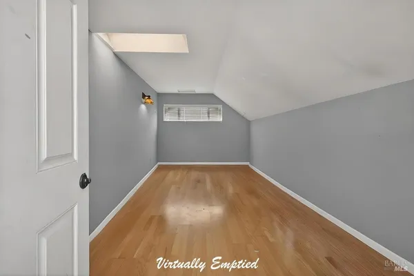 a view of empty room with stairs