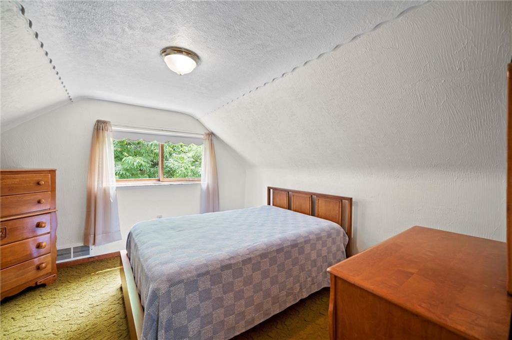 3332 Jacks Run Road North Versailles, PA 15137 - Photo 23 of 30 a bedroom with a bed and a window