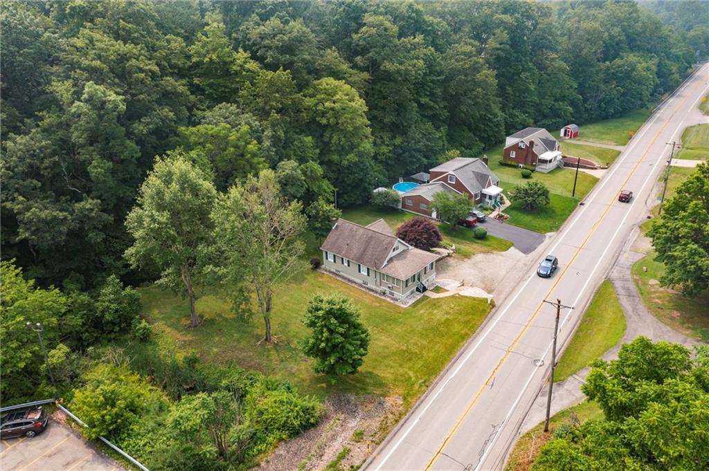 3332 Jacks Run Road North Versailles, PA 15137 - Photo 3 of 30 a view of a yard with potted plants