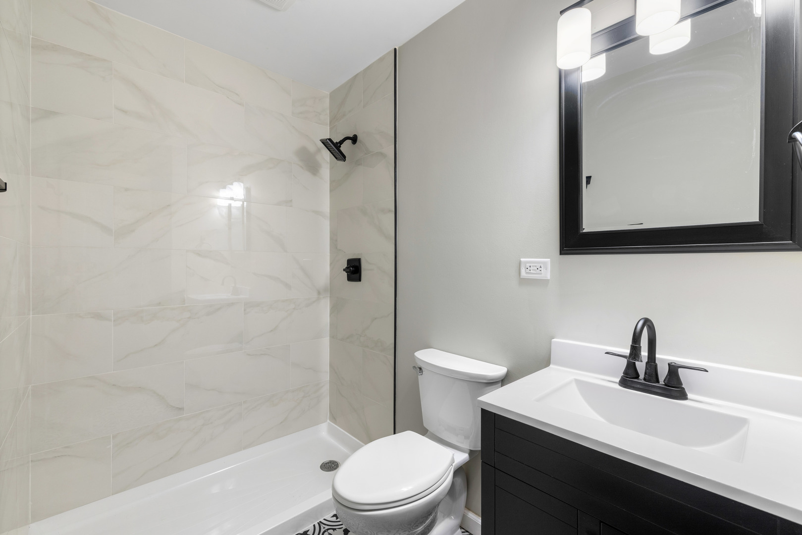 222 Pell Avenue Romeoville, IL 60446 - Photo 12 of 27 a bathroom with a sink a toilet and shower