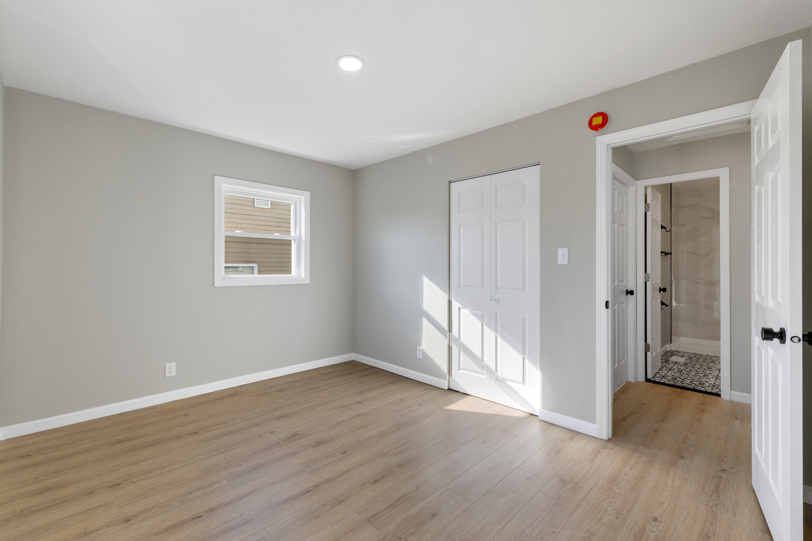 222 Pell Avenue Romeoville, IL 60446 - Photo 14 of 27 a view of a livingroom with wooden floor and a window