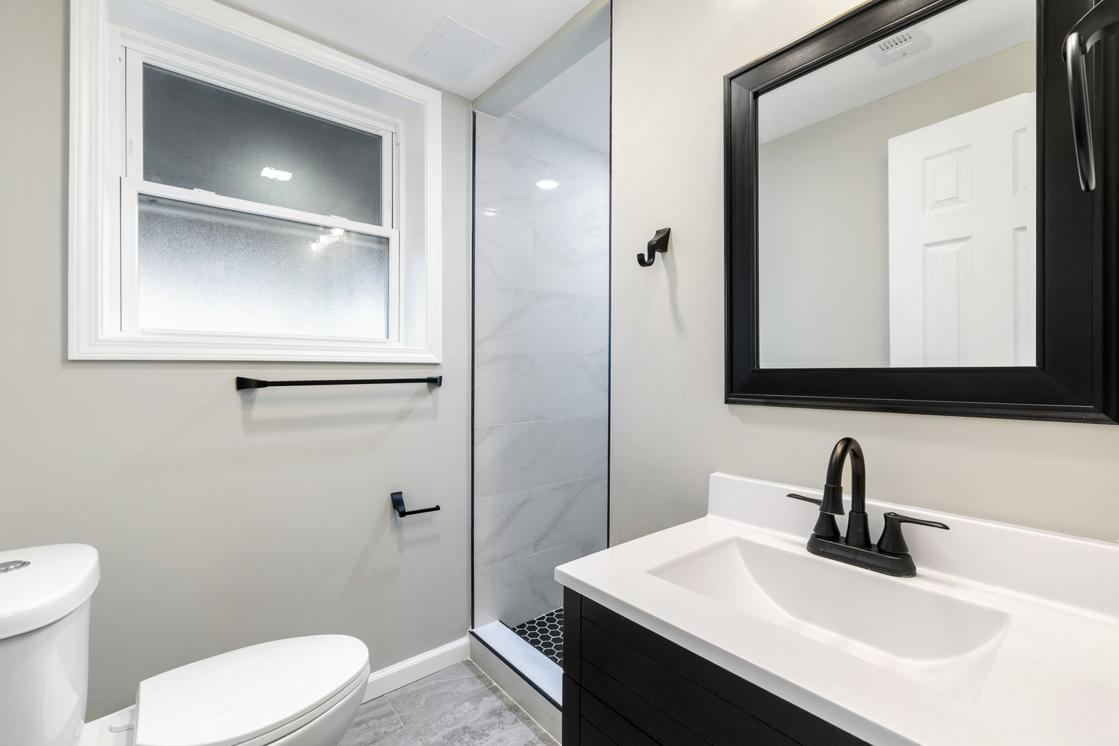 222 Pell Avenue Romeoville, IL 60446 - Photo 19 of 27 a bathroom with a sink a toilet and mirror