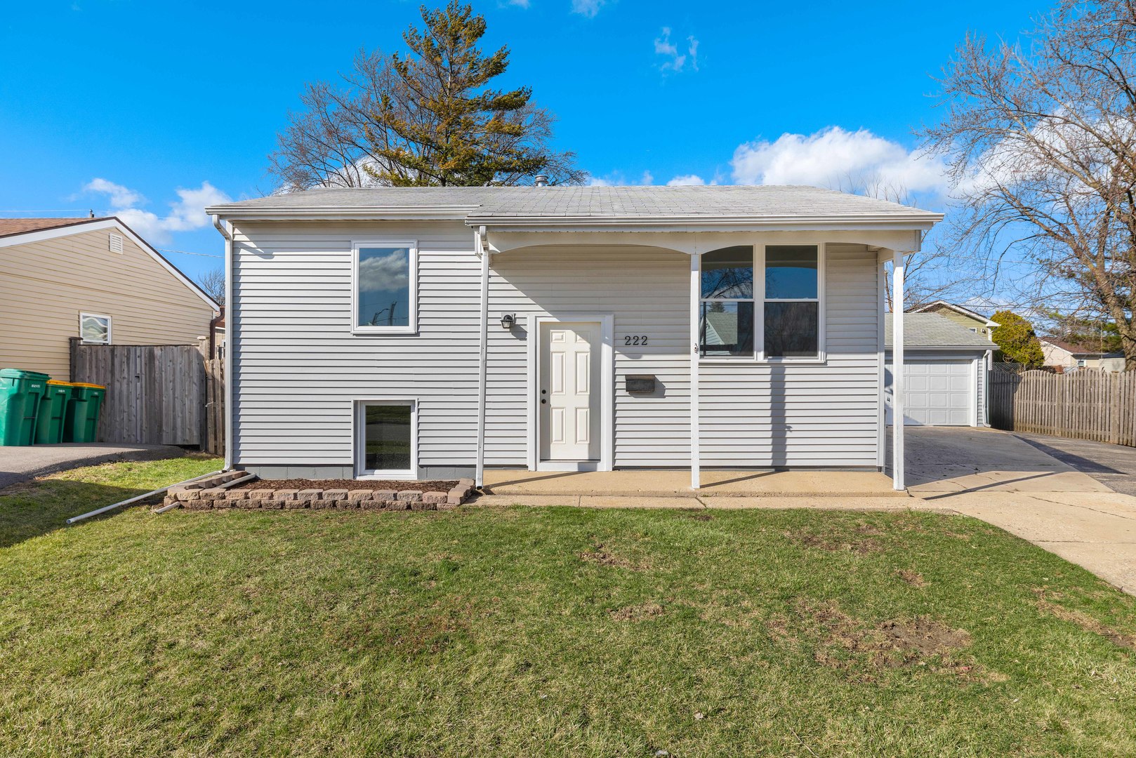 222 Pell Avenue Romeoville, IL 60446 - Photo 2 of 27 a front view of a house with a yard