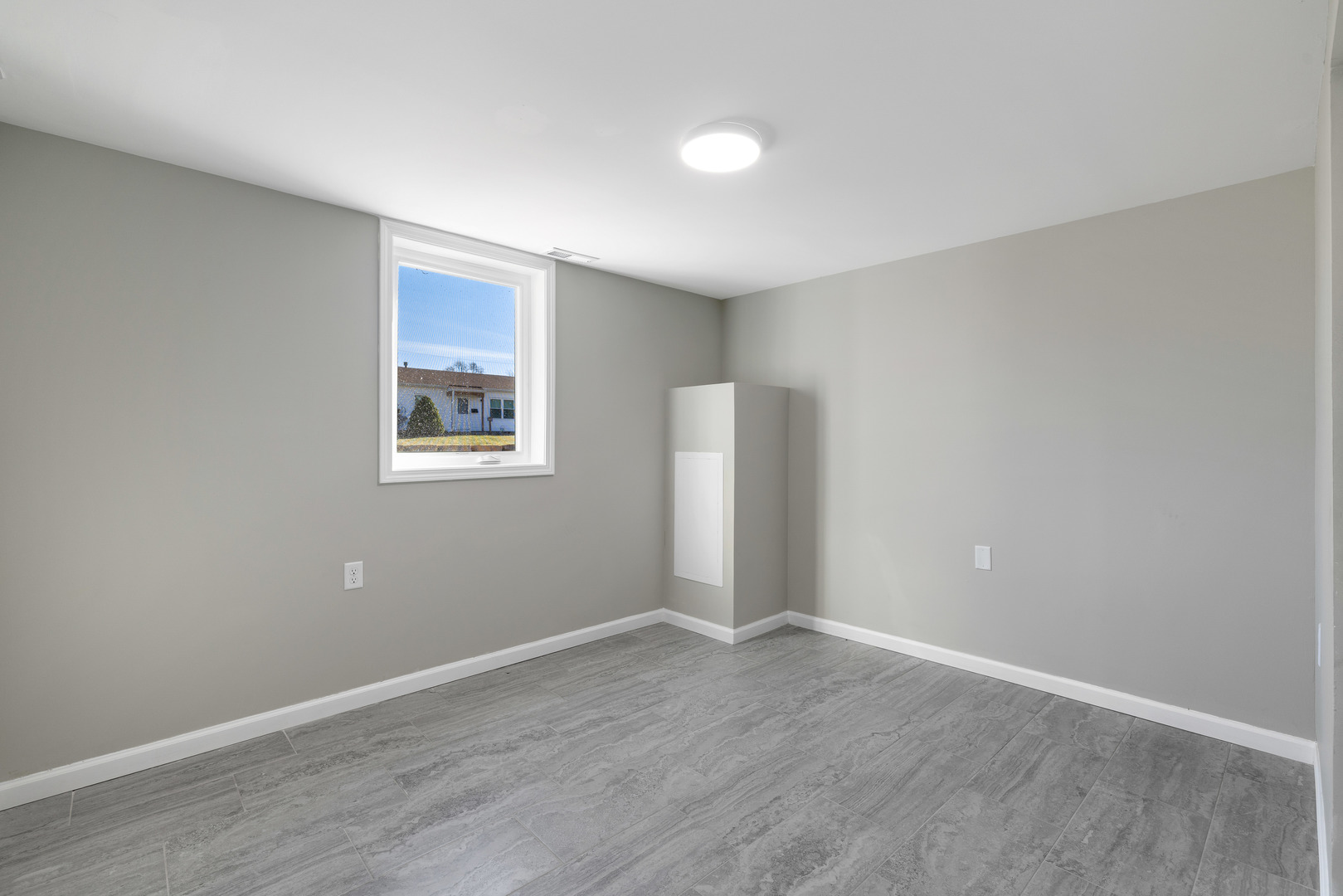 222 Pell Avenue Romeoville, IL 60446 - Photo 21 of 27 a view of an empty room with wooden floor and a window