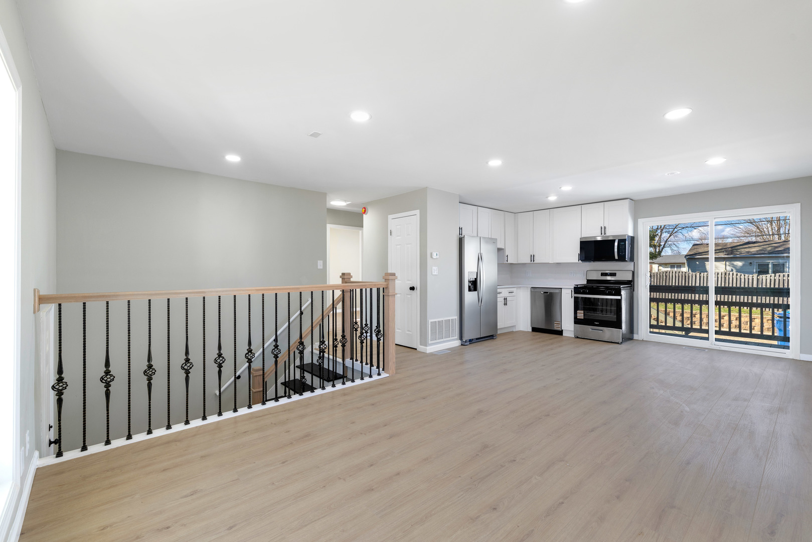 222 Pell Avenue Romeoville, IL 60446 - Photo 5 of 27 a view of a kitchen with large windows