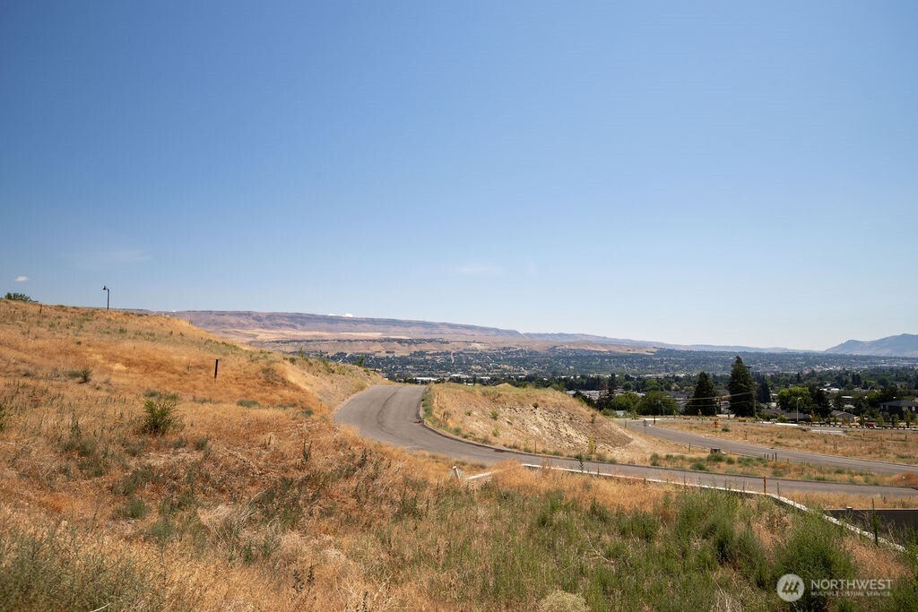 0 Lot 4 Farmstead Lane Wenatchee, WA 98801 - Photo 11 of 24 an aerial view of residential houses with outdoor space