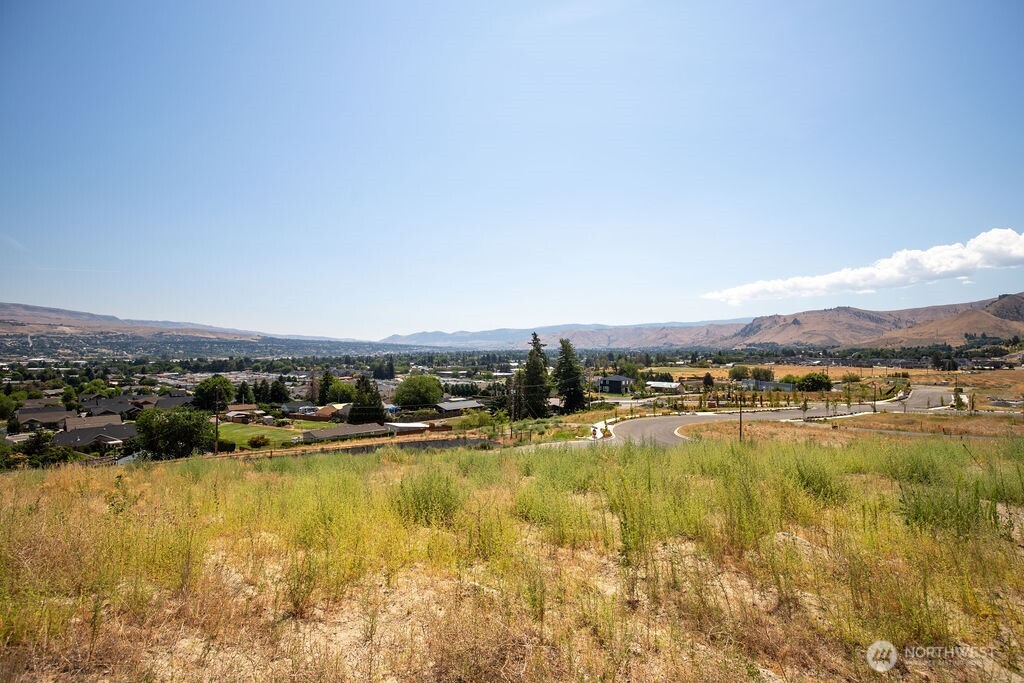 0 Lot 4 Farmstead Lane Wenatchee, WA 98801 - Photo 20 of 24 a view of a city with an ocean beach