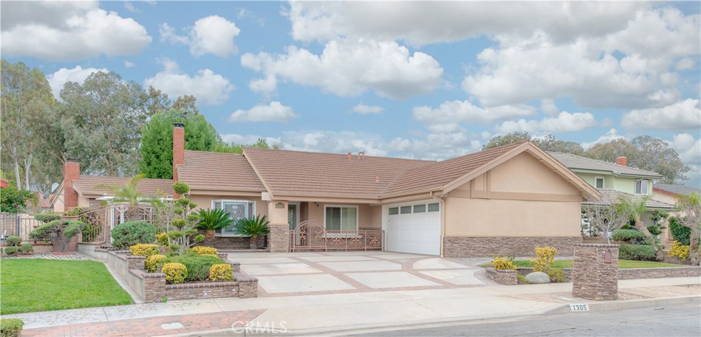 1305 Post Road Fullerton, CA 92833 - Photo 1 of 1 a view of house with garden